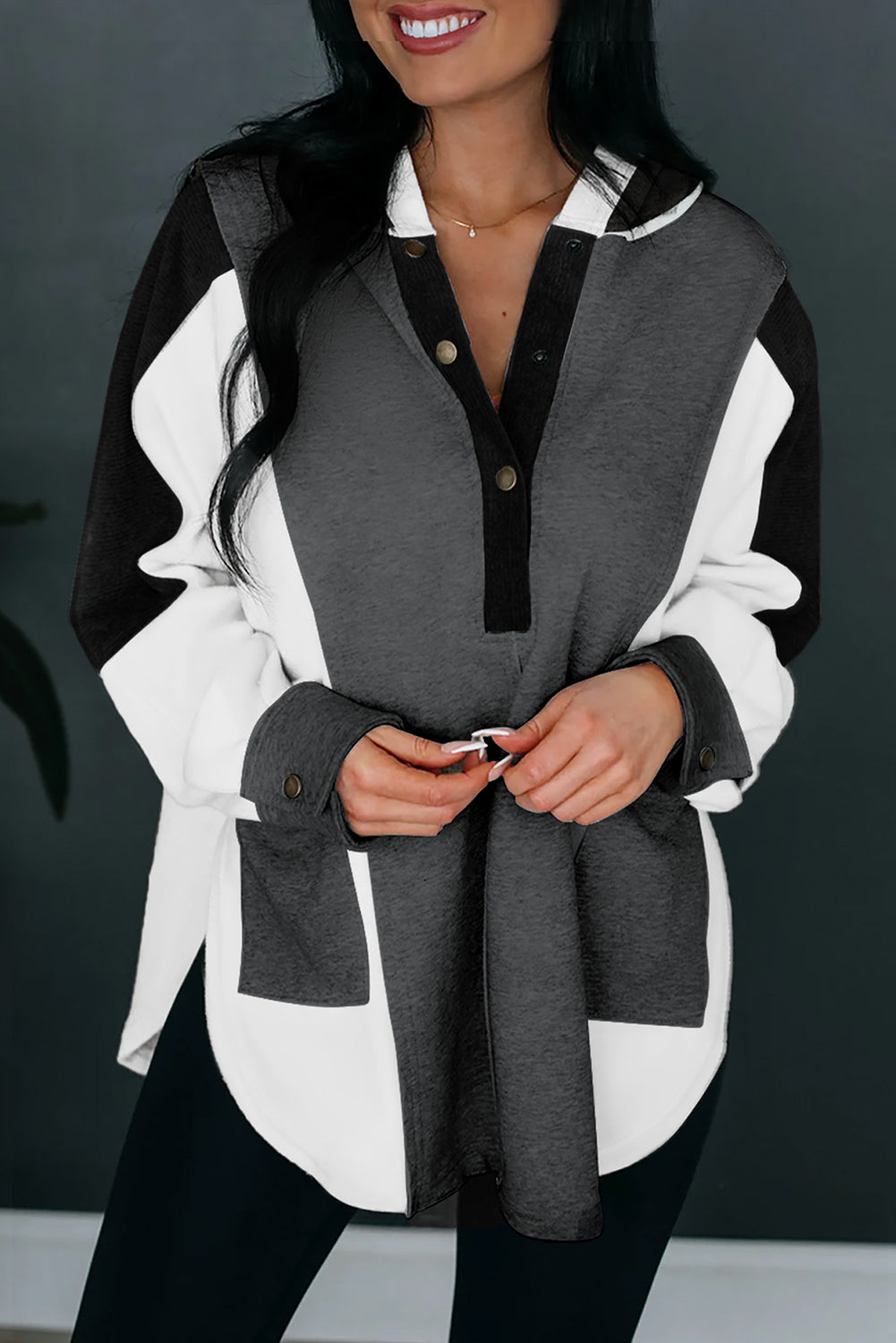 Black Color Block Exposed Seam Buttoned Neckline Hoodie