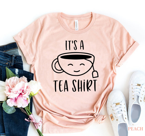 t shirts, shirts with quotes, funny quote t shirts, gift ideas, "its a tea shirt" with a cup of tee, graphic t shirts, get well gifts, birthday gift ideas, funny t shirts, funny shirts, tea lovers, clothes, tops, outfits, influencer style, custom shirts , anniversary gift, birthday gift, teacher's gifts, teacher appreciation gift , back to school clothes