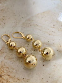 earrings, gold earrings, ball earrings, statement earrings, long earrings, big  gold earrings, stelring silver earrings, hypoallergenic earrings, luxury earrings, nice jewelry, womens earrings, birthday gifts, anniversary gifts, graduation gifts, jewelry for special occasions, casual jewelry, cute earrings, designer earrings, designer jewelry, ball jewelry