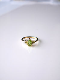 rings, gold ring, peridot rings, gold peridot rings, gemstone rings, dainty gemstone rings, dainty birthstone rings, august birthstone jewelry, 925 rings, gold plated jewelry, fashion jewelry, accessories, statement rings , dainty rings, trending on titkok, gift ideas, birthday gifts, anniversary, graduation gifts, fine jewelry, designer jewelry, green crystal jewelry, tiny rings, popular rings, emerald rings, pear shape rings, gold plated, gold vermeil peridot rings