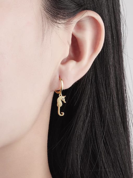 seahorse earrings, sea horse hoop earrings, gold earrings, gold plated earrings, huggie earrings with charms, hoop earrings with charms, birthdya gifts, anniversary gifts, holiday gifts, cool jewelry, cool earrings, cheap earrings, good quality earrings, minimalist earrings, minimalist jewelry, trending on tiktok, jewelry store in Miami, cute earrings, seahorse jewelry , beach jewelry, ocean jewelry