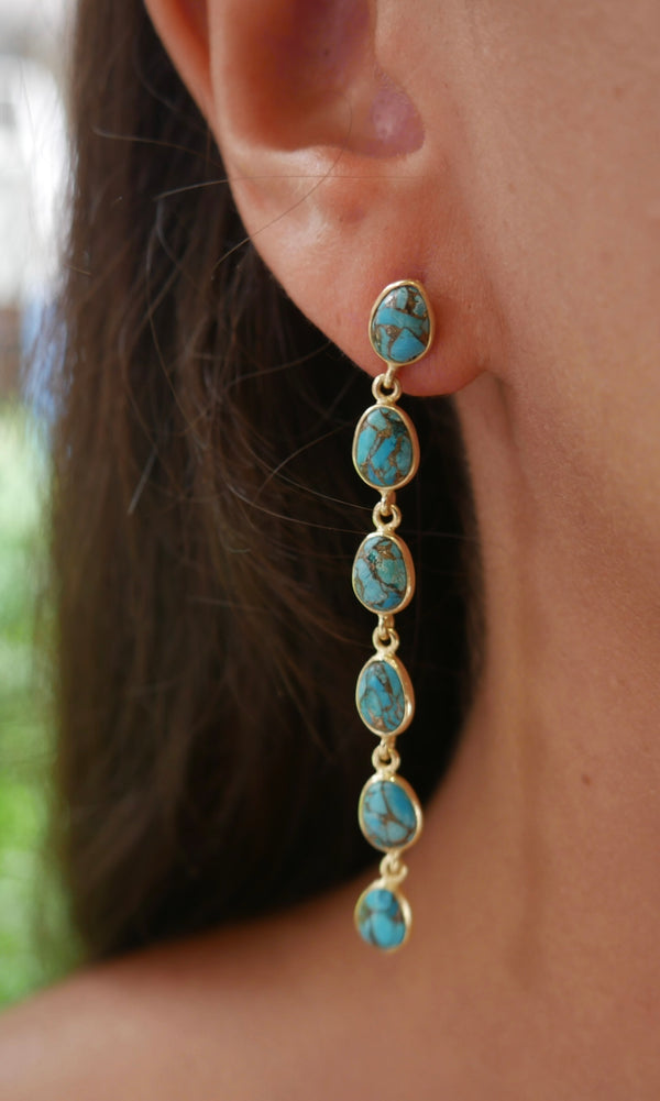 Earrings, gold earrings, Turquoise earrings,  Turquoise gemstone earrings, earrings with crystals, wedding earrings, jewelry websites, birthday earrings, vintage earrings, blue earrings for sensitive ears, long blue earrings, long gold earrings Kesley Boutique, Kesley Isaza shopping in Miami, popular jewelry, popular earrings, designer earrings, birthday gifts, anniversary gifts, nice earrings, dangle earrings, birthstone jewelry, trending on tiktok, fashion jewelry, cool earrings, nice earrings