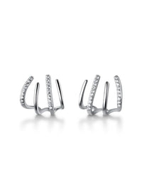 claw earrings with rhinestone diamond cz cubic zirconia wateproof unique trending earrings for men and woman trending on instagram and tiktok influencer brands. jewelry store unique trending. Miami, brickell shopping . designer inspired earrings. Earrings make it look like more than one piercing.  stud earrings white gold unique earrings .925 sterling silver Kesley Boutique