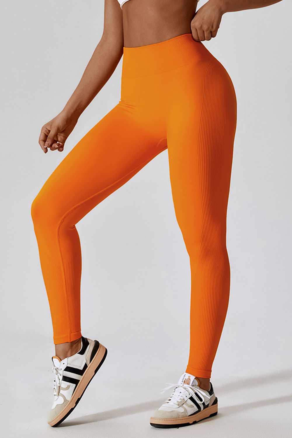 yoga pants, butt shaping yoga pants that lift butt, yoga clothes, workout outfits, orange workout clothes, orange yoga pants