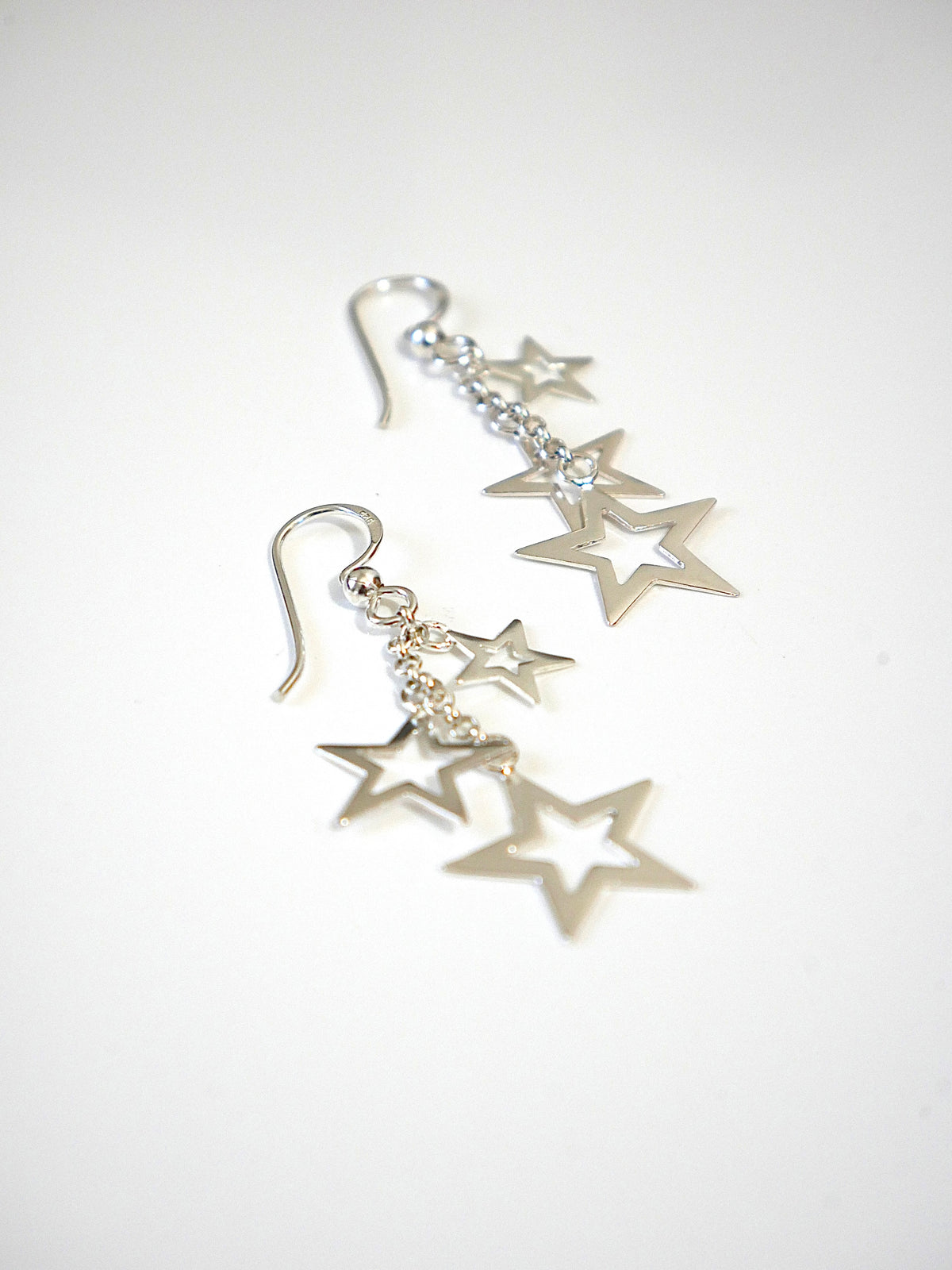 earrings, dangling star earrings, good quality, white gold, wont tarnish, sterling silver .925, designer, luxury, dangling star earrings, cute accessories, casual everyday earrings, festival earrings, hook earrings, pandora inspired earrings, tiffanys, balenciaga, statement hook earrings, birthday gift idea, dangling earringsKesley Boutique