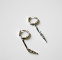 earrings, silver earrings, jewelry, statement earrings, accessories, fashion jewelry, cool earrings, trending jewelry, Trending on tik tok, fine jewelry, christmas gifts, birthday gifts, anniversary gifts, dangly earrings, earrings with a bullet, earrings with a spike, dagger jewelry, cool silver jewelry, small hoop earrings for men, spike earrings, spike hoop earrings, bullet earrings, sterling silver bullet earrings, jewelry in Miami, shopping in Brickell, jewelry store in Brickell, jewelry store in Miami