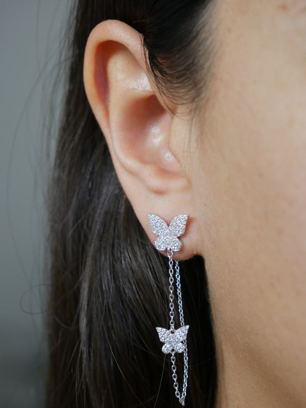 Butterfly earrings with chain pave diamond cz cubic zirconia two butterflies dangling sterling silver .925 luxury statement earrings designer inspired earrings, unique trending, waterproof, influencer style earrings trending on instagram and tiktok, dainty long earrings for sensitive ears, wont turn green or tarnish, festival jewelry, Coachella earrings influencer style Kesley Boutique popular influencer brands  Miami brickell Jewelry