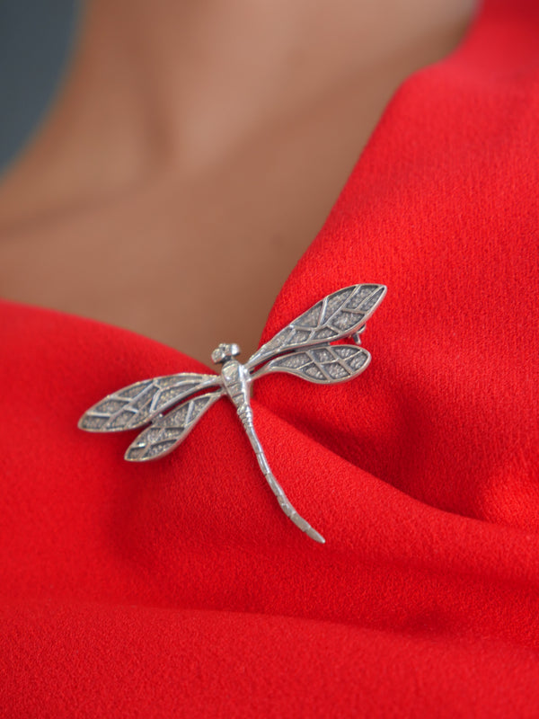 Dragonfly Brooch, sterling silver brooch. classic jewelry to pass down. pin for scarves, pin for poncho, pin for sweaters. clothing pin. lucky amulet jewelry. dragonfly jewelry. unique dragonfly gifts. shopping in Miami, shopping in Brickell. trending jewelry store. popular brands instagram and tiktok Kesley Boutique 