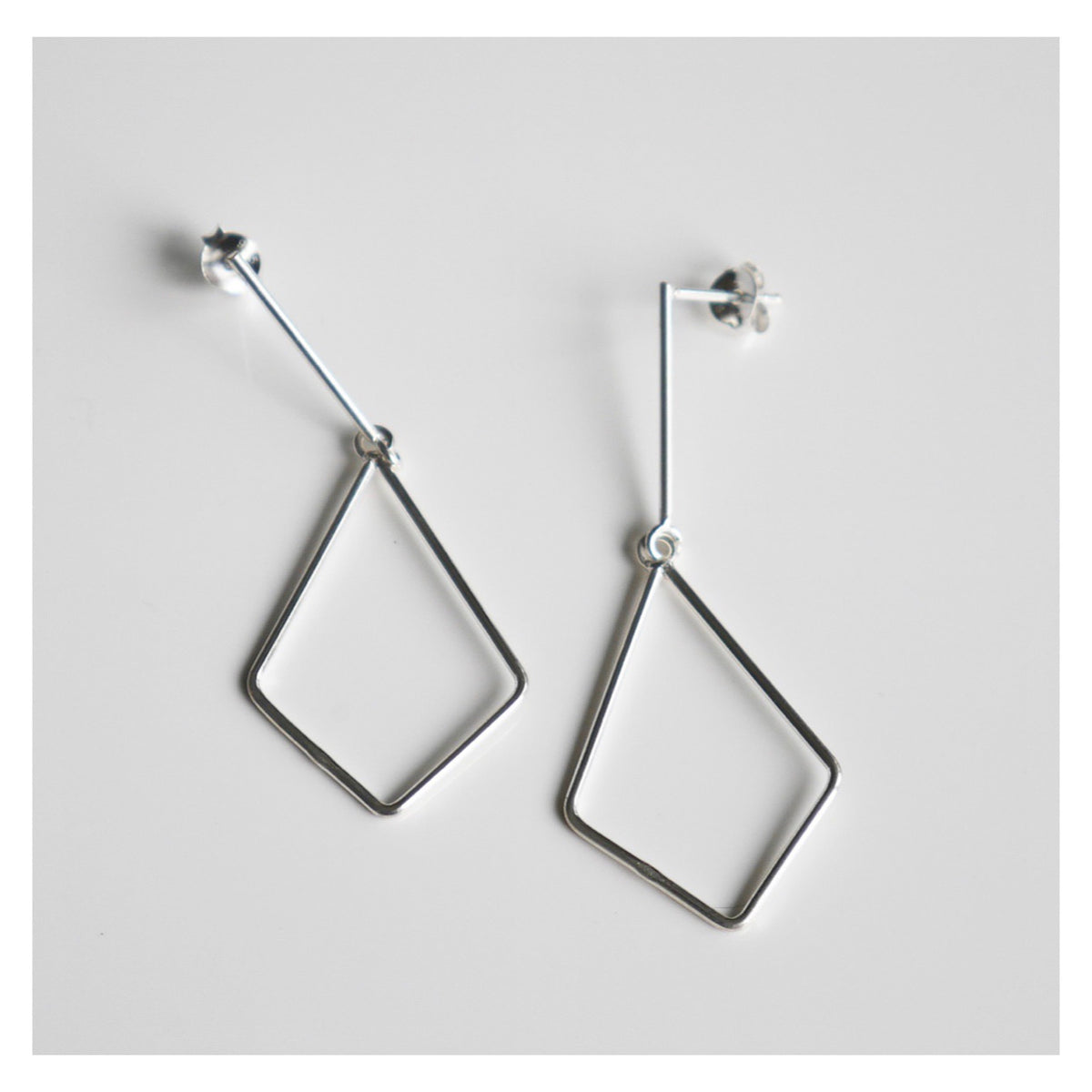 Geometric Hang-low Silver Earrings