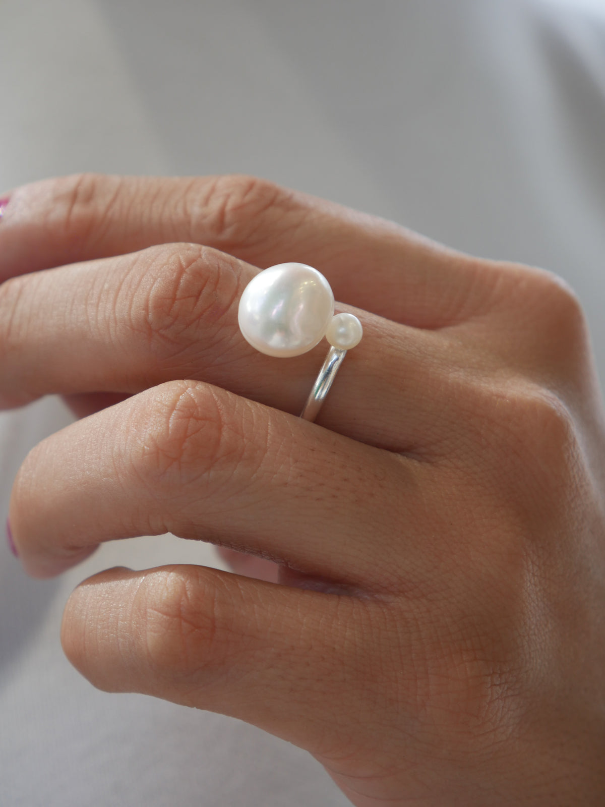 big pearl ring with a small pearl white gold statement pearl ring, adjustable waterproof. Shopping in Miami. Jewelry store in Brickell. influencer brands and jewelry. Tiktok famous brands. gift ideas for mom and grandma. Wedding jewelry. Bridesmaids rings.